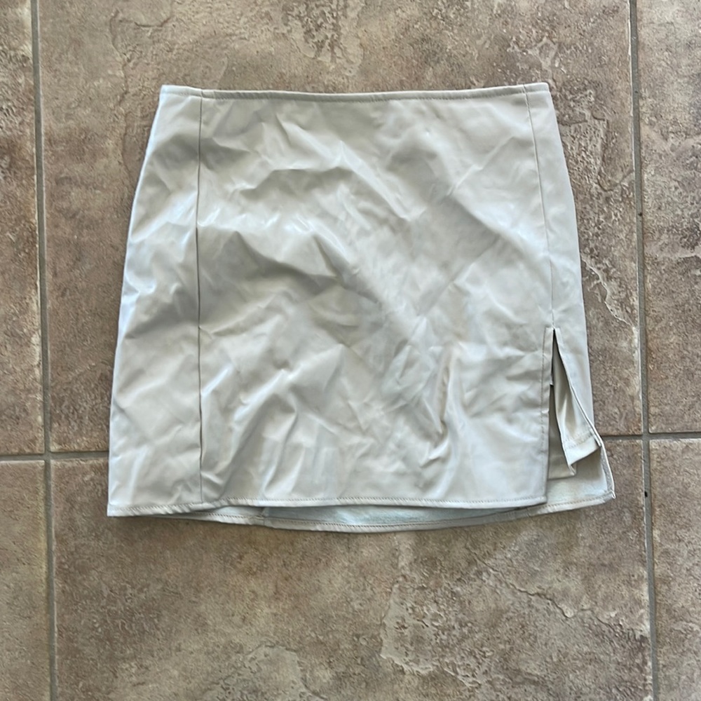 from fashion nova size small made of polyester and leather never worn